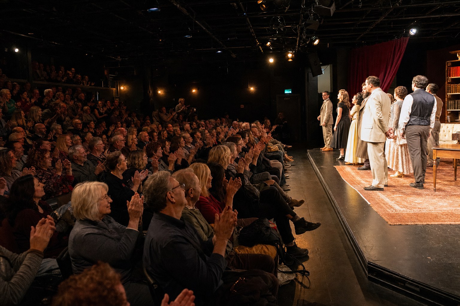 A full house watching a performance in Harrowlight’s intimate black box theatre